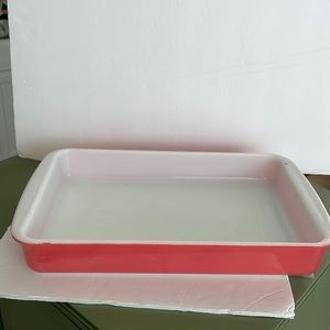 Red Pyrex baking dish.